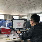 Operator reviewing a job at a workstation